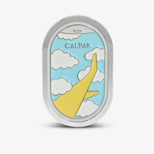 NWT Calpak Silver Enamel Pin